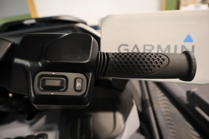 Slide: The Image of Close-up of 2025 Sea-Doo Switch Cruise Limited 21 handlebar with Garmin device. - 17
