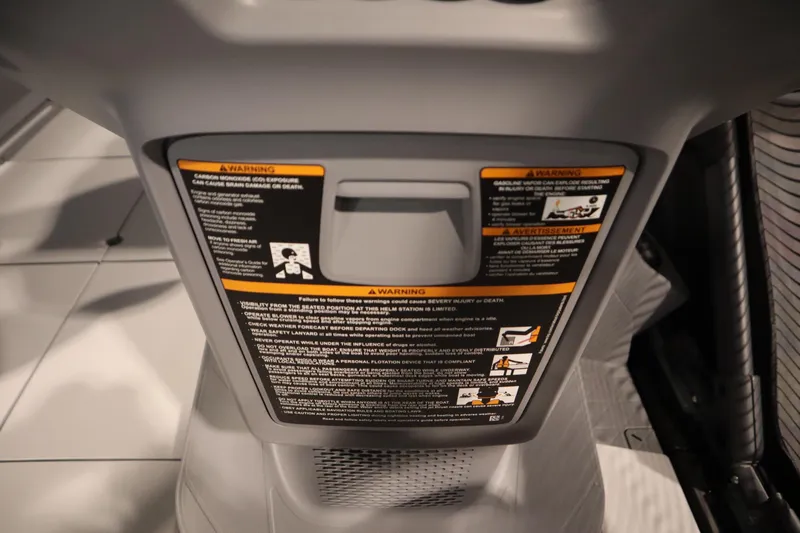 Slide: The Image of 2025 Sea-Doo Switch Cruise Limited 21 dashboard with safety warnings and instructions. - 19