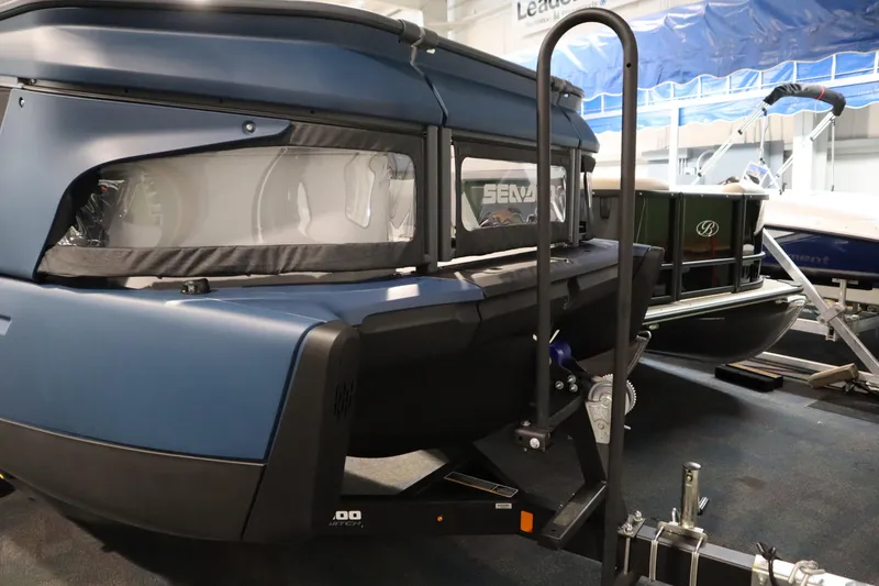 Slide: The Image of 2025 Sea-Doo Switch Cruise Limited 21 on trailer in showroom. - 29