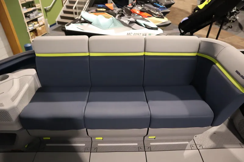 Slide: The Image of 2025 Sea-Doo Switch Cruise Limited 21 seating area with modern design and comfortable cushions. - 6