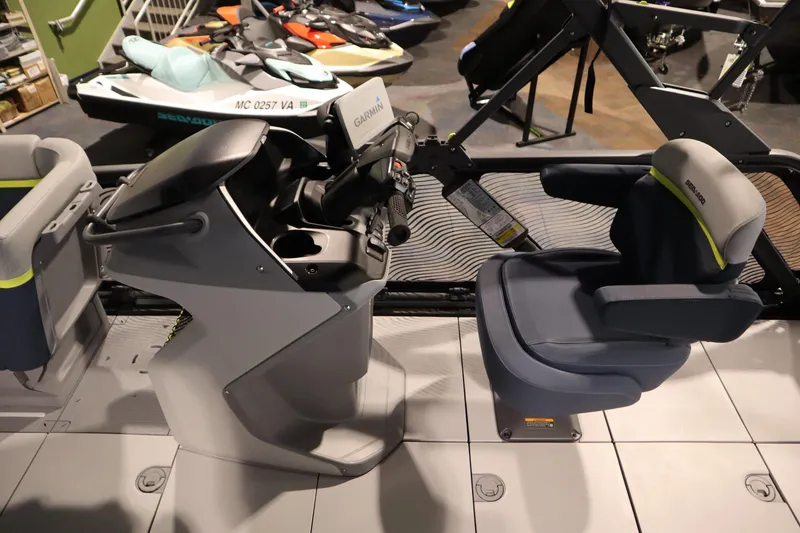 Slide: The Image of 2025 Sea-Doo Switch Cruise Limited 21 interior with steering console and seating. - 8