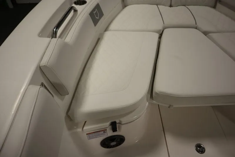 Slide: The Image of 2025 Sea Fox 248 Commander boat interior with white cushioned seating. - 14
