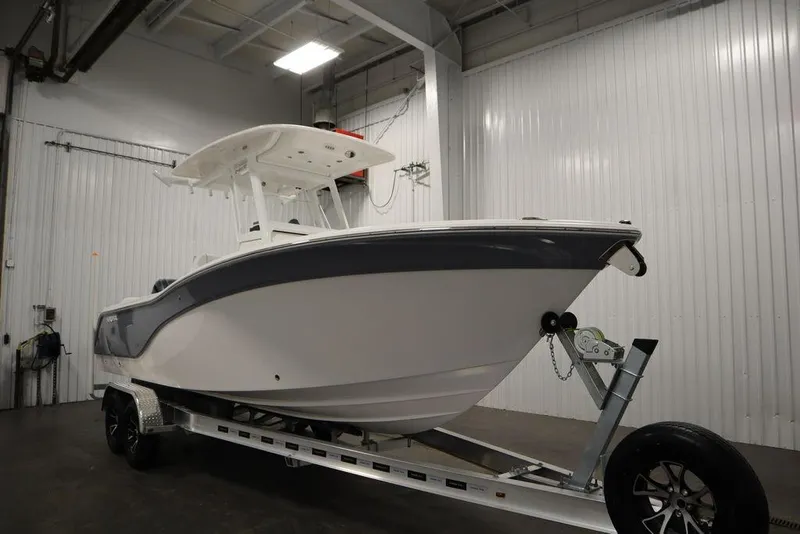 Slide: The Image of 2025 Sea Fox 248 Commander boat on trailer in indoor storage. - 3