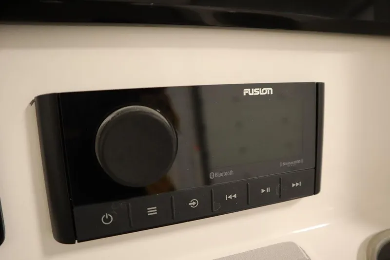 Slide: The Image of Fusion audio system on 2025 Sea Fox 248 Commander boat dashboard. - 31