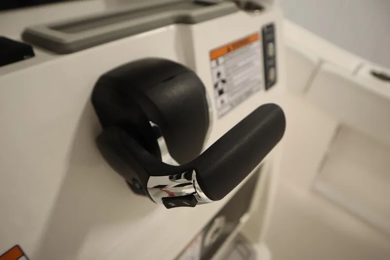 Slide: The Image of Close-up of throttle control on 2025 Sea Fox 248 Commander boat. - 32
