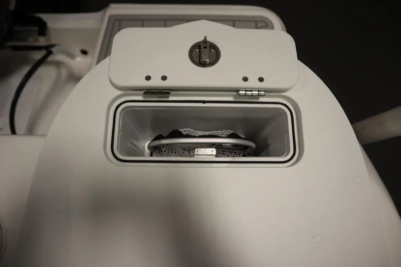 Slide: The Image of 2025 Sea Fox 248 Commander storage compartment with open lid. - 42