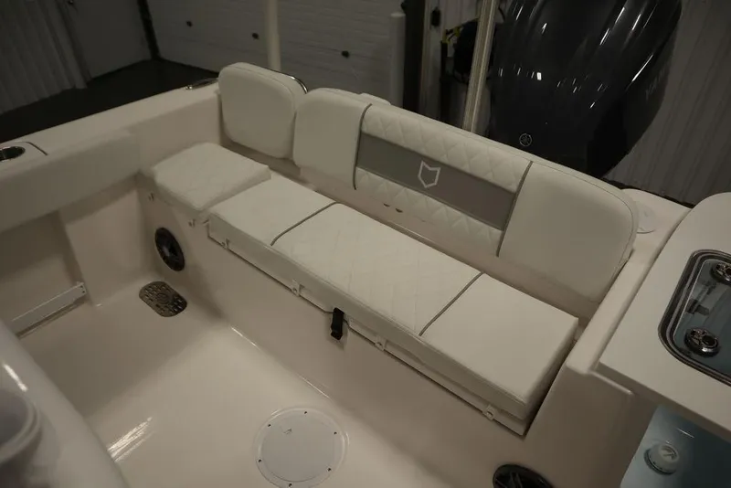 Slide: The Image of 2025 Sea Fox 248 Commander boat interior with cushioned seating. - 43