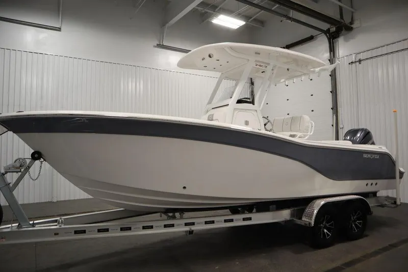 Slide: The Image of 2025 Sea Fox 248 Commander boat on trailer in indoor storage. - 8