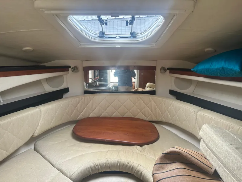 Slide: The Image of 2007 Sea Ray 260 Sundancer cabin interior with seating and table. - 32