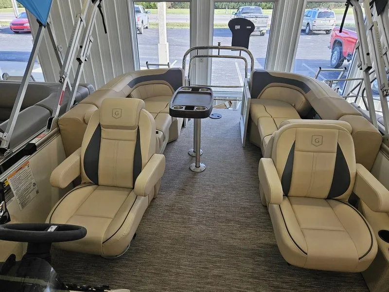 Slide: The Image of Luxurious interior of 2025 Godfrey SWEETWATER 2286 SB pontoon boat with plush seating. - 5