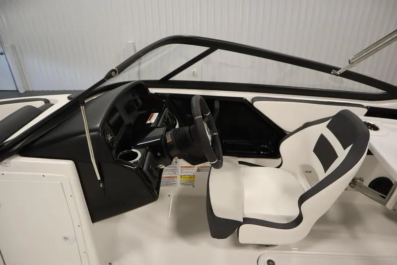 Slide: The Image of 2025 Yamaha Boats SX195 cockpit with modern steering and comfortable seating. - 21