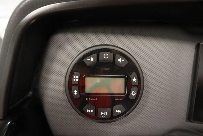 Slide: The Image of Control panel of 2025 Yamaha Boats SX195 with Bluetooth and audio settings. - 24