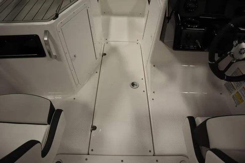 Slide: The Image of 2025 Yamaha Boats SX195 interior cockpit with seating and steering wheel. - 25