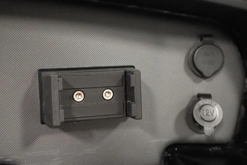 Slide: The Image of Control panel of 2025 Yamaha SX195 boat with AUX, USB, and 12V outlets. - 27