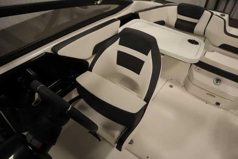 Slide: The Image of 2025 Yamaha Boats SX195 interior with sleek seating and modern design. - 28
