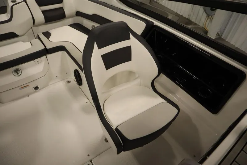 Slide: The Image of 2025 Yamaha Boats SX195 interior with sleek black and white seating design. - 34