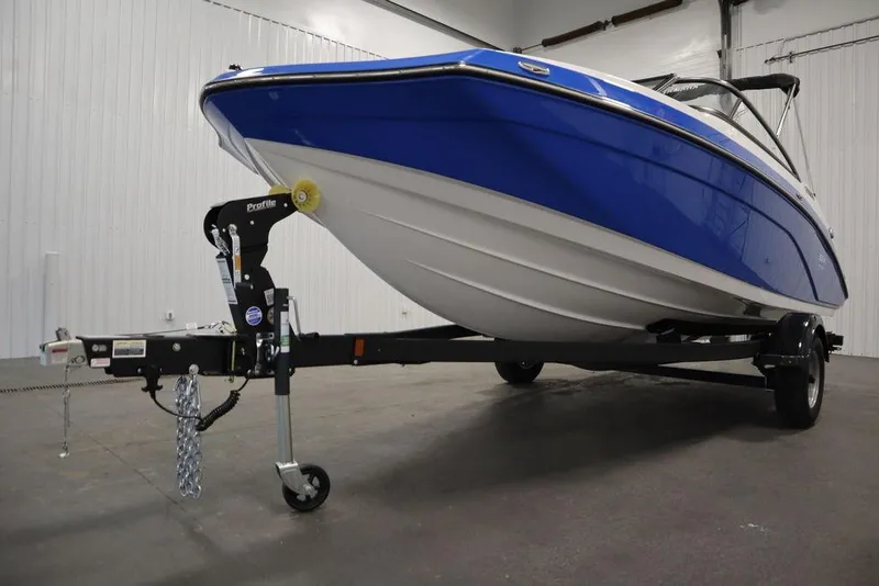Slide: The Image of 2025 Yamaha Boats SX195 on trailer in indoor storage facility. - 46
