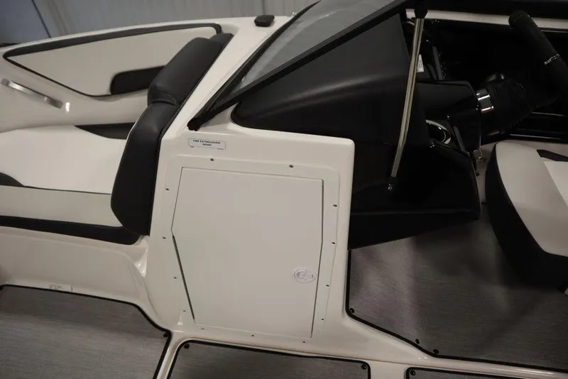 Slide: The Image of 2025 Yamaha Boats SX195 interior, featuring sleek seating and modern design elements. - 13