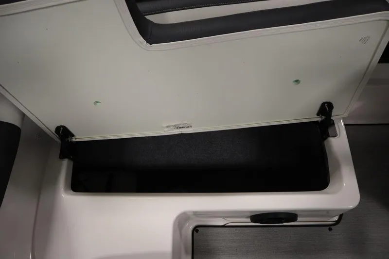 Slide: The Image of Open storage compartment in 2025 Yamaha Boats SX195. - 28