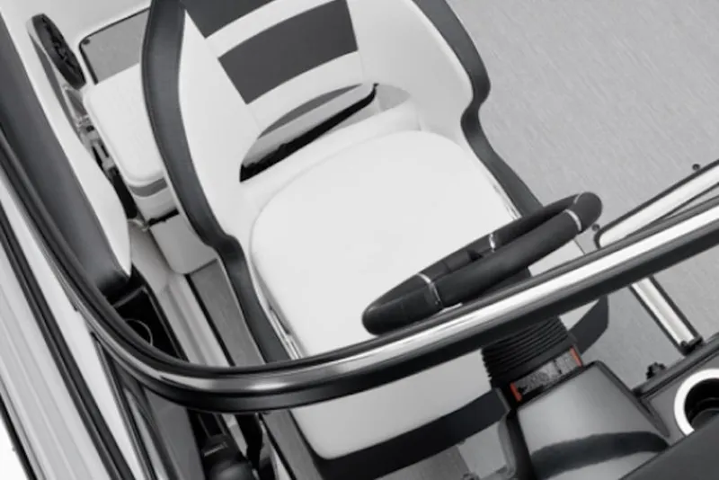 Slide: The Image of 2025 Yamaha Boats SX195 cockpit with sleek steering wheel and modern seating design. - 45