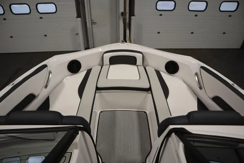 Slide: The Image of 2025 Yamaha Boats 195 SX interior with sleek seating and modern design. - 11