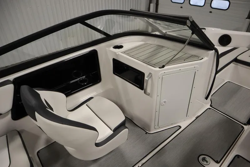 Slide: The Image of 2025 Yamaha Boats 195 SX interior with sleek seating and modern dashboard design. - 33
