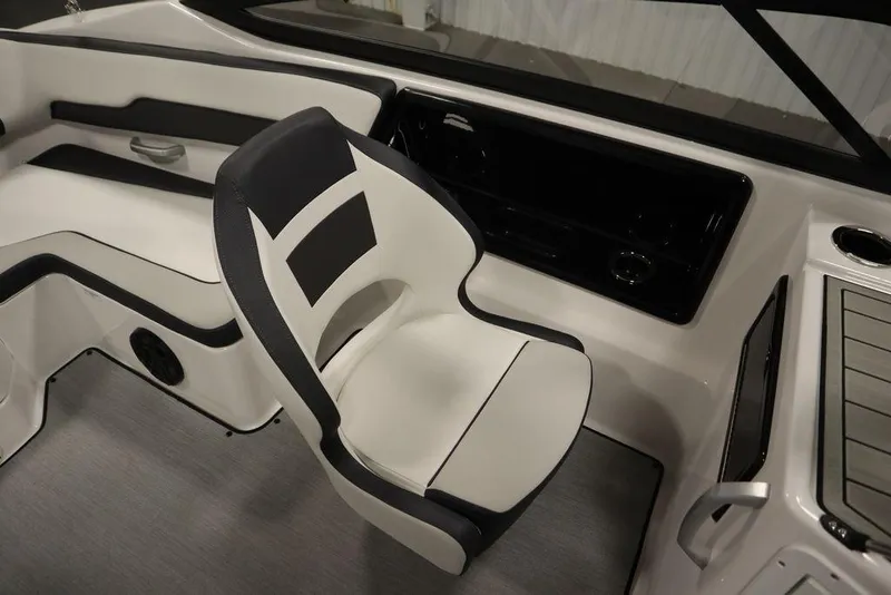 Slide: The Image of 2025 Yamaha Boats 195 SX cockpit with modern seating and dashboard design. - 37