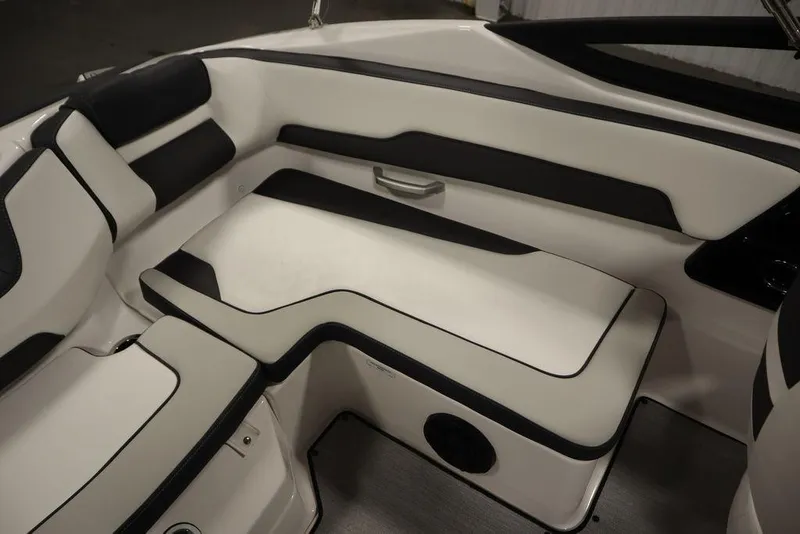 Slide: The Image of Interior seating of 2025 Yamaha Boats 195 SX, featuring sleek black and white design. - 39