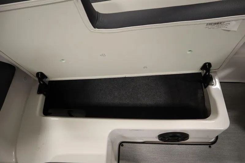 Slide: The Image of Open storage compartment in 2025 Yamaha Boats 195 SX. - 40