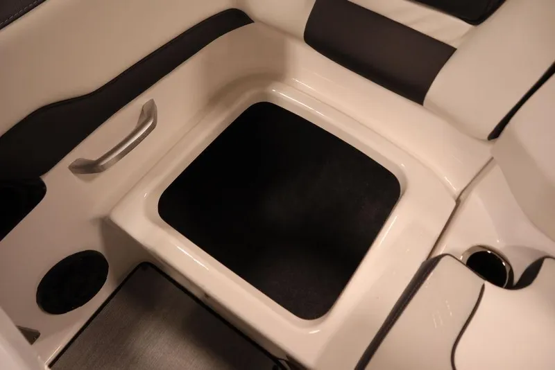 Slide: The Image of 2025 Yamaha Boats 195 SX interior seating with black and white upholstery. - 43