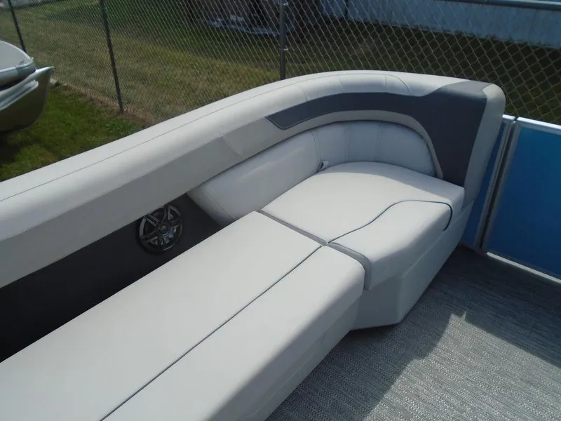 Slide: The Image of 2025 Godfrey Sweetwater 2286 C boat interior with plush seating and modern design. - 14