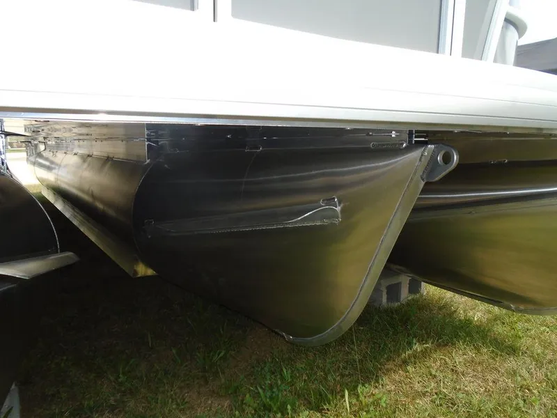 Slide: The Image of 2025 Godfrey Sweetwater 2286 C pontoon boat underside, showcasing sleek aluminum pontoons. - 21