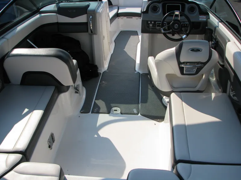 Slide: The Image of 2015 Chaparral Vortex 223 VRX-Surf boat interior with seating and steering console. - 15