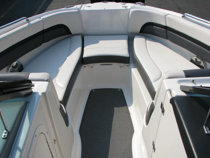 Slide: The Image of 2015 Chaparral Vortex 223 VRX-Surf boat interior with white and black seating. - 7