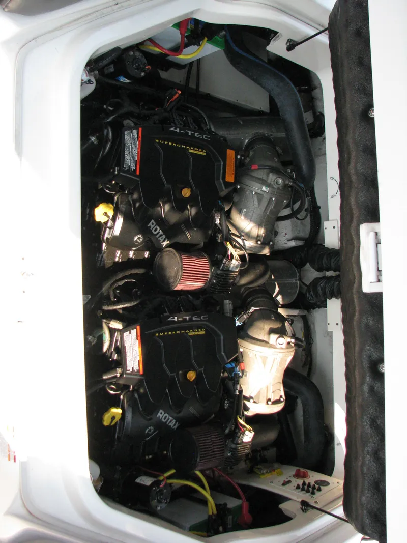 Slide: The Image of 2015 Chaparral Vortex 223 VRX-Surf engine compartment with dual Rotax engines. - 9