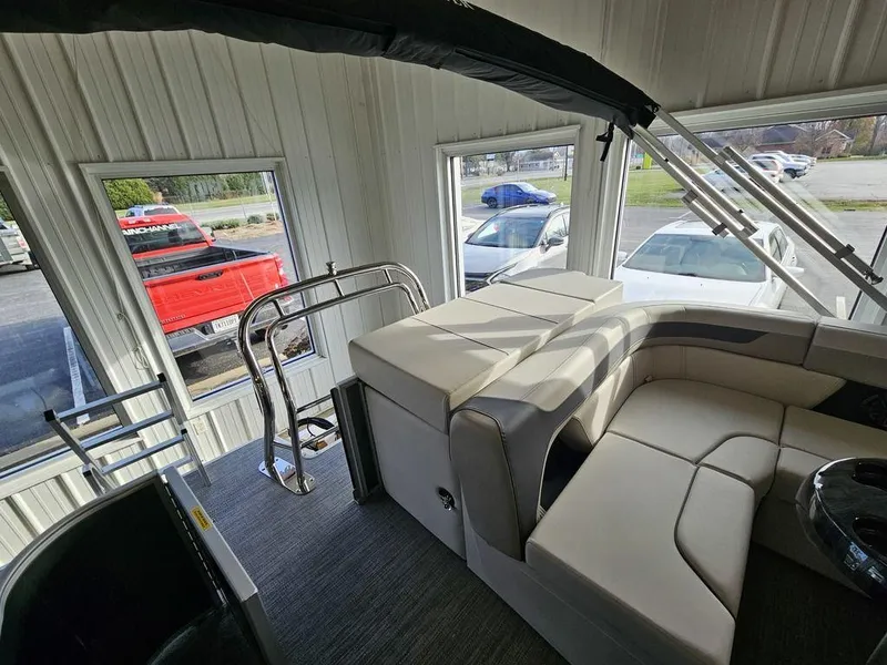 Slide: The Image of Interior of 2025 Godfrey Sweetwater 2286 C pontoon boat with plush seating. - 15