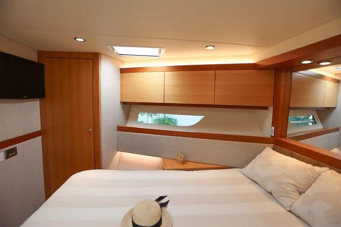 Slide: The Image of Luxurious interior of 2016 Riviera 525 SUV yacht bedroom with modern design. - 36