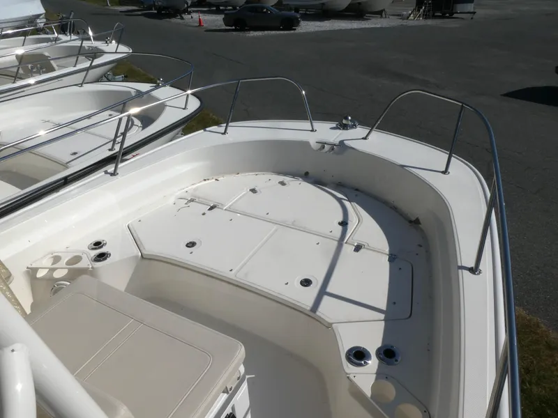 Slide: The Image of 2025 Boston Whaler 210 Montauk boat deck, spacious and well-equipped for fishing. - 8