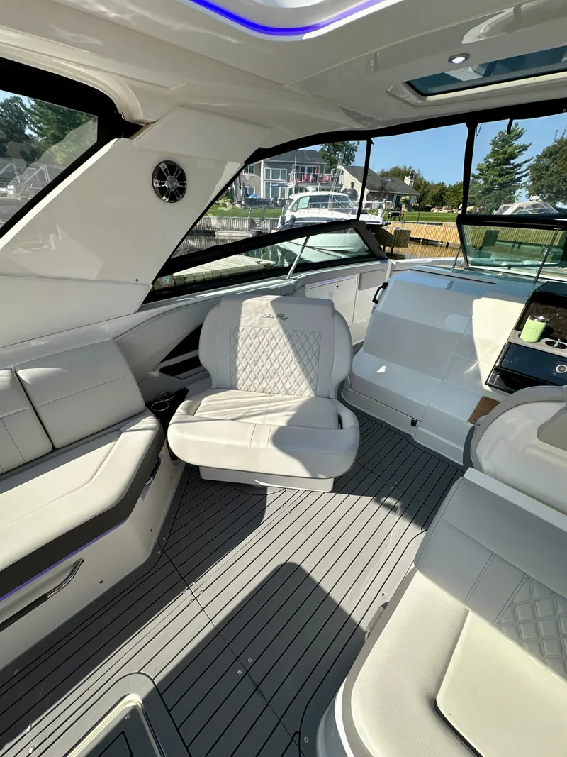 Slide: The Image of Luxurious interior of 2021 Sea Ray SLX 400 Outboard boat with elegant seating. - 24