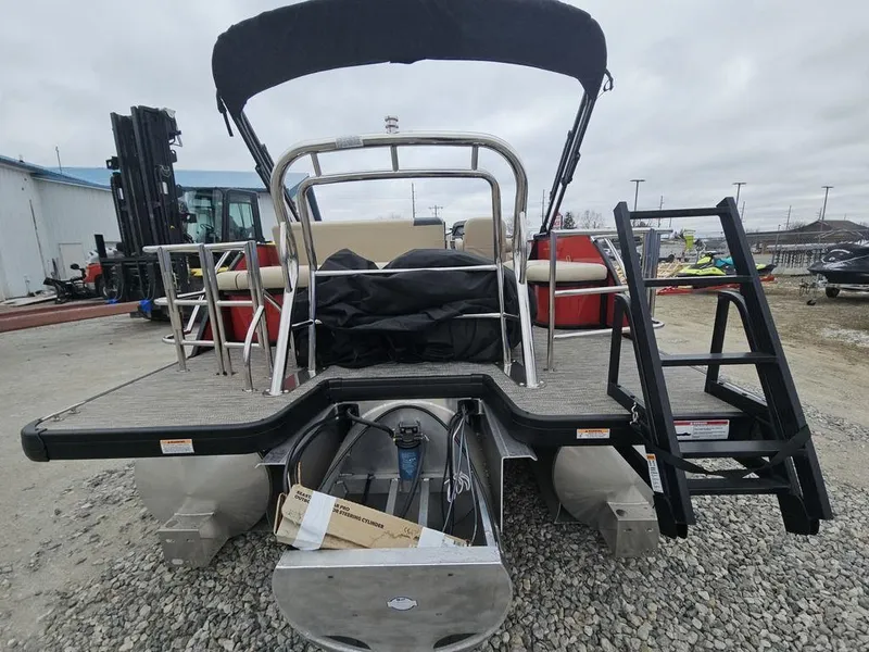 Slide: The Image of 2025 Godfrey Sweetwater 2286 SFL pontoon boat with center tube package, rear view. - 14