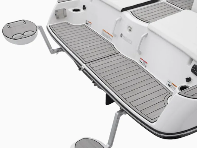 Slide: The Image of 2025 Yamaha Boats 222 SE swim platform with sleek design and cup holders. - 5