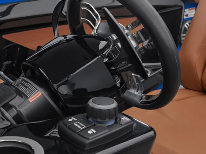 Slide: The Image of 2025 Yamaha Boats 222 XD steering wheel and control panel, featuring sleek design and modern technology. - 5
