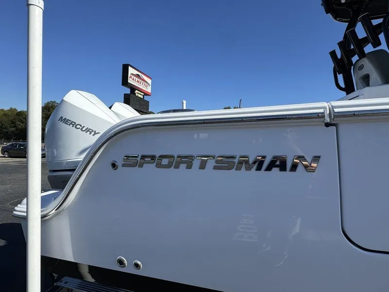Slide: The Image of 2025 Sportsman Open 282 boat with Mercury engine, side view. - 3