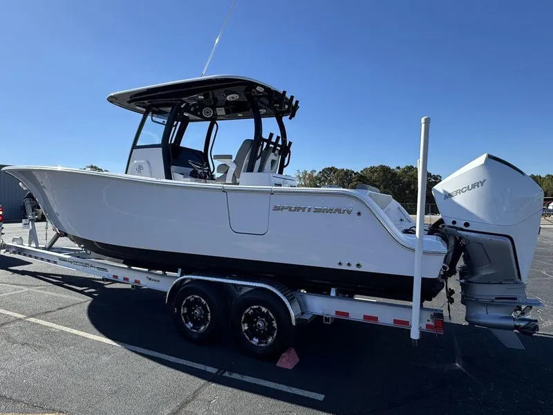 Slide: The Image of 2025 Sportsman Open 282 boat on trailer, featuring Mercury outboard engine. - 6