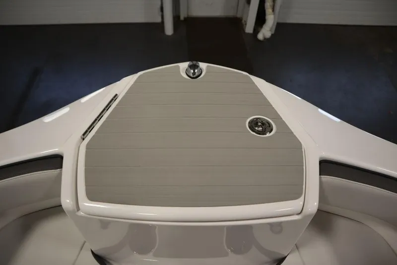 Slide: The Image of 2025 Yamaha Boats 250 SX bow with sleek design and modern features. - 10