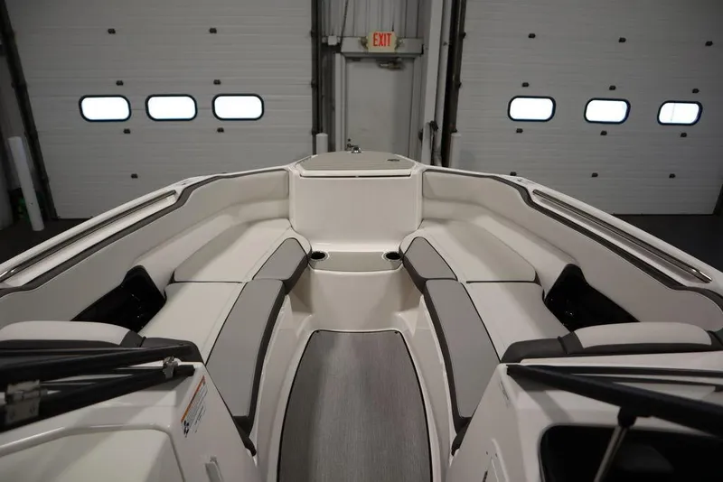 Slide: The Image of 2025 Yamaha Boats 250 SX interior with sleek seating and modern design. - 11