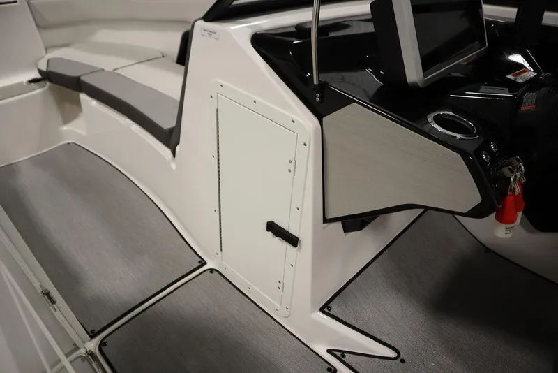 Slide: The Image of 2025 Yamaha Boats 250 SX interior with sleek design and modern dashboard. - 19