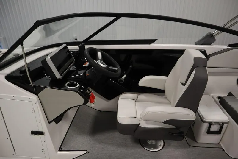 Slide: The Image of 2025 Yamaha Boats 250 SX cockpit with modern steering and seating. - 21