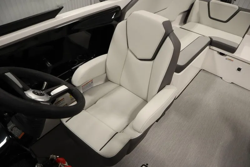 Slide: The Image of Interior of 2025 Yamaha Boats 250 SX, featuring sleek white seating and modern design. - 30