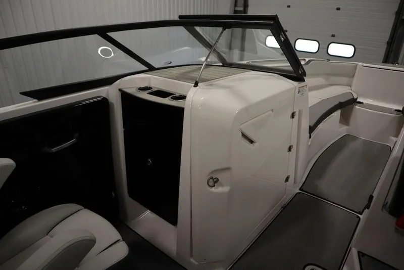 Slide: The Image of 2025 Yamaha Boats 250 SX interior, featuring sleek seating and modern design elements. - 32